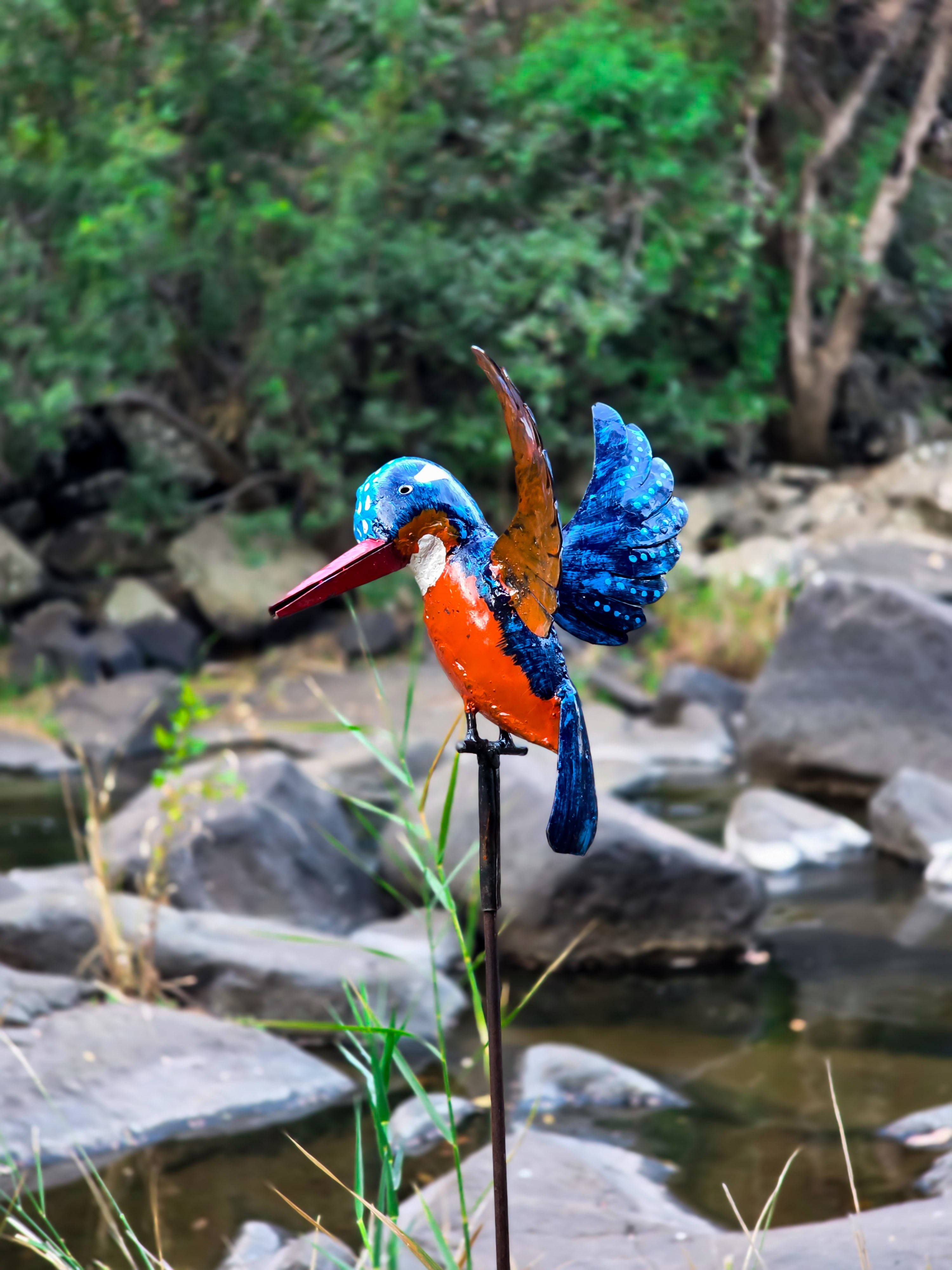 Flying kingfisher garden sculpture on metal rod, side view, weather-resistant Vidaron varnish